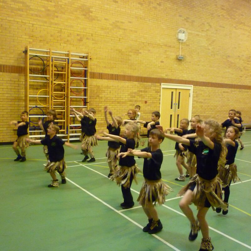 Children dancing in African dance costumes