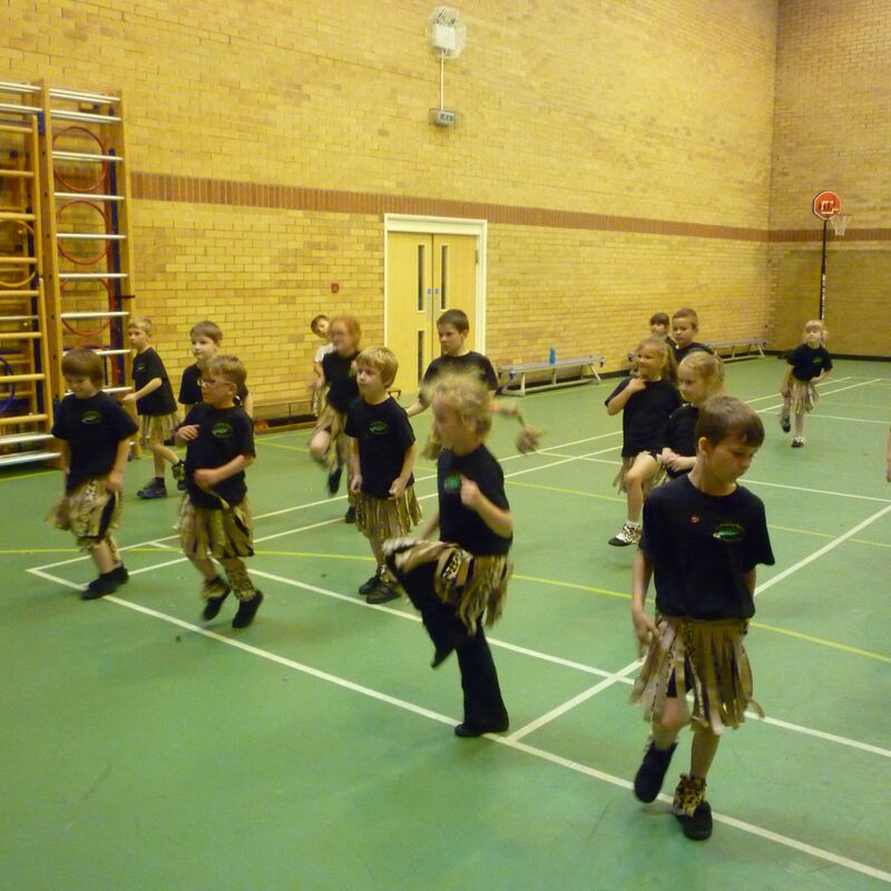Children dancing in African dance costumes
